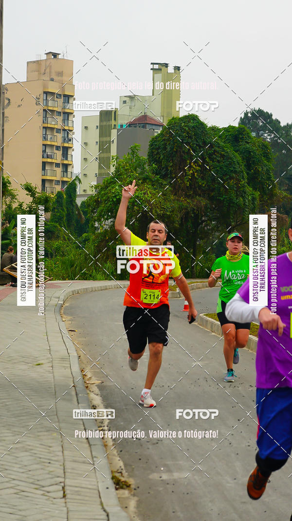Buy your photos of the eventMeia Maratona de Blumenau on Fotop