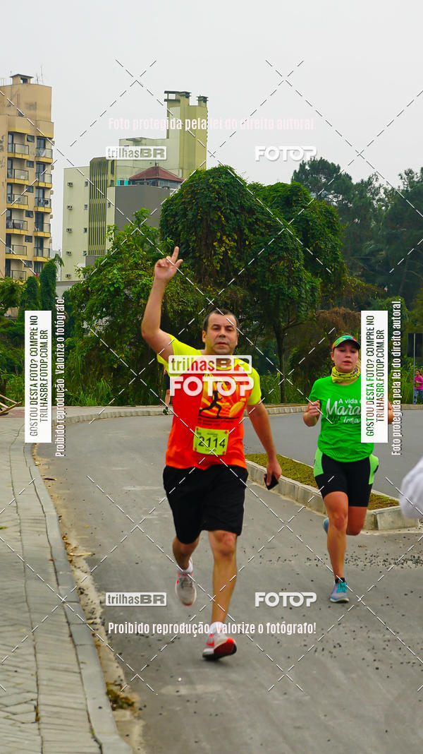 Buy your photos of the eventMeia Maratona de Blumenau on Fotop