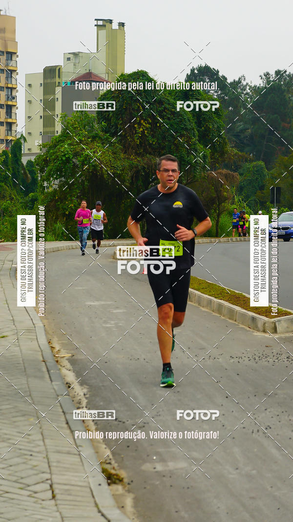 Buy your photos of the eventMeia Maratona de Blumenau on Fotop