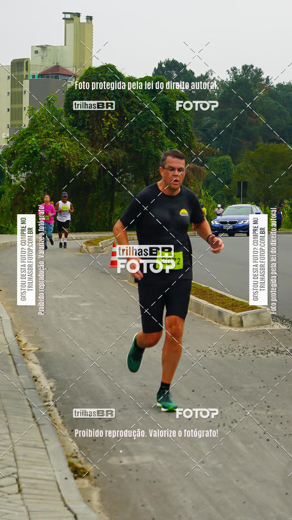 Buy your photos of the eventMeia Maratona de Blumenau on Fotop
