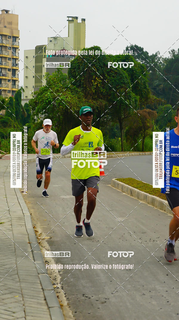 Buy your photos of the eventMeia Maratona de Blumenau on Fotop