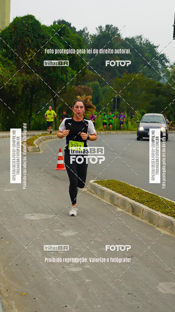 Buy your photos of the eventMeia Maratona de Blumenau on Fotop