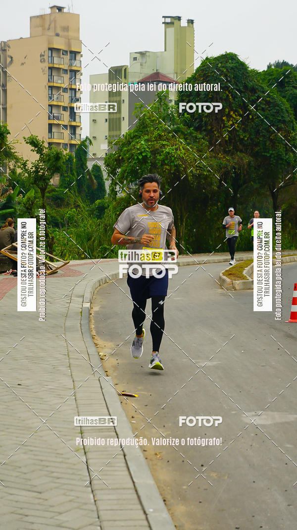 Buy your photos of the eventMeia Maratona de Blumenau on Fotop