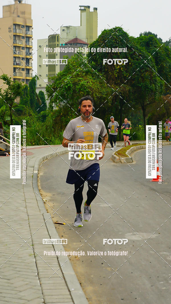 Buy your photos of the eventMeia Maratona de Blumenau on Fotop