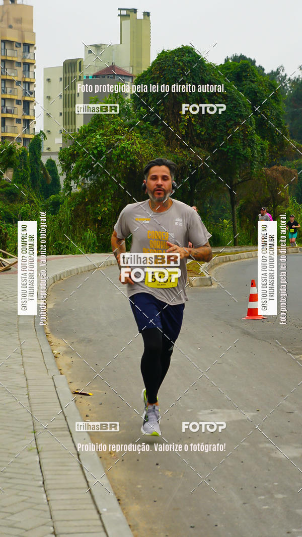 Buy your photos of the eventMeia Maratona de Blumenau on Fotop