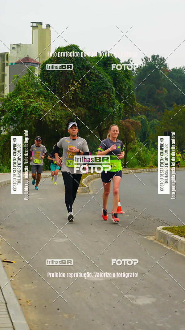 Buy your photos of the eventMeia Maratona de Blumenau on Fotop