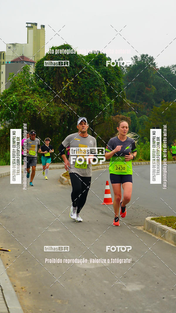Buy your photos of the eventMeia Maratona de Blumenau on Fotop