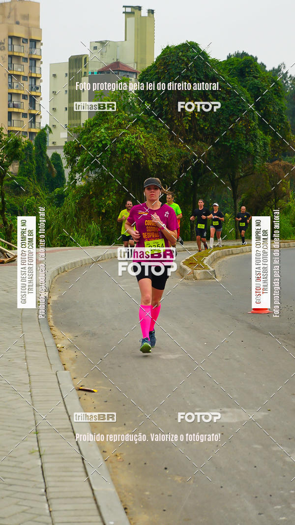 Buy your photos of the eventMeia Maratona de Blumenau on Fotop