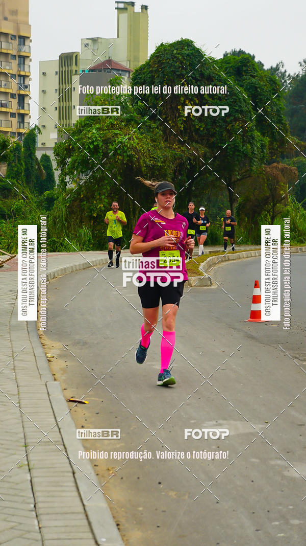 Buy your photos of the eventMeia Maratona de Blumenau on Fotop