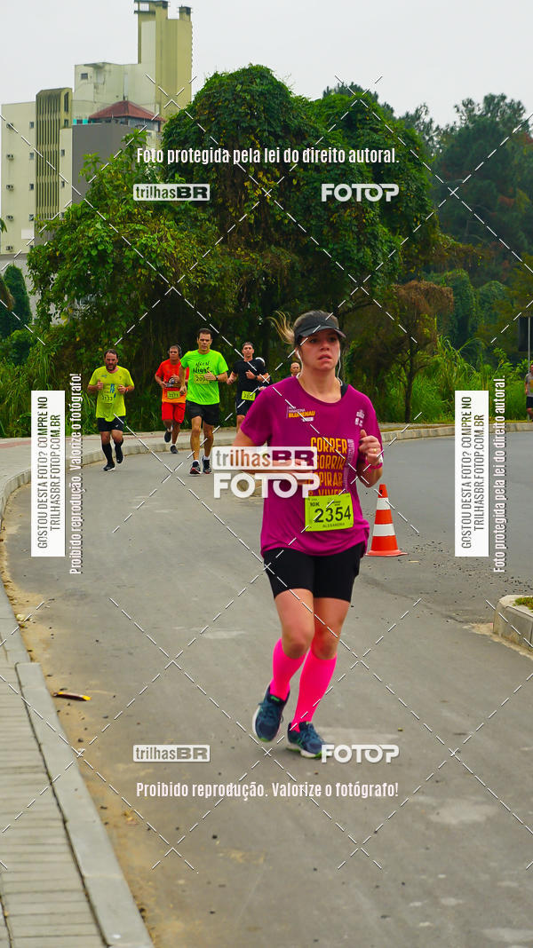 Buy your photos of the eventMeia Maratona de Blumenau on Fotop