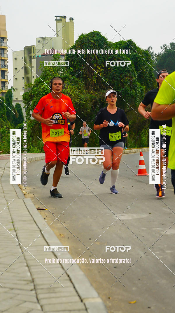Buy your photos of the eventMeia Maratona de Blumenau on Fotop