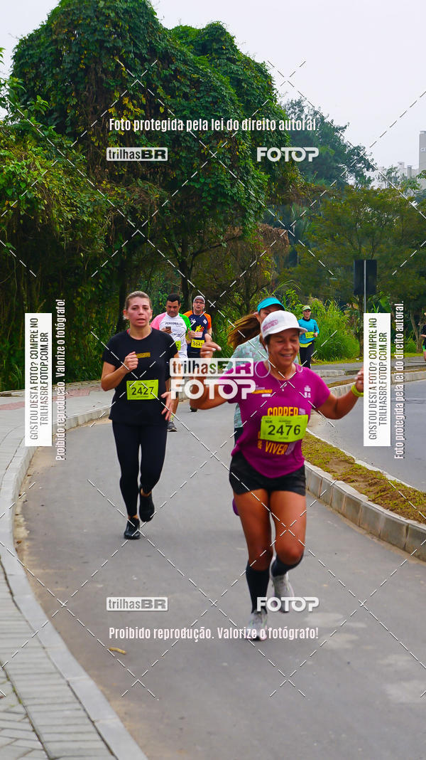 Buy your photos of the eventMeia Maratona de Blumenau on Fotop