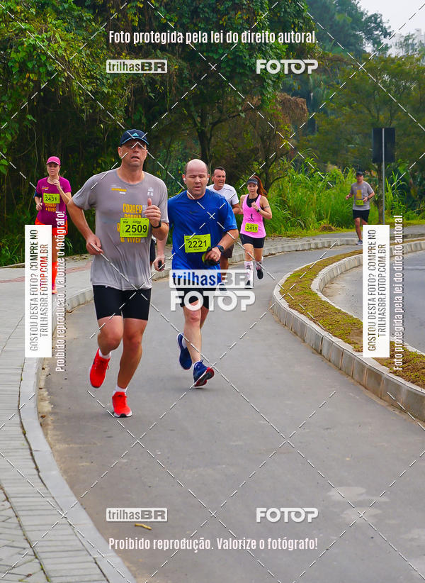 Buy your photos of the eventMeia Maratona de Blumenau on Fotop