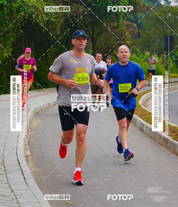 Buy your photos of the eventMeia Maratona de Blumenau on Fotop
