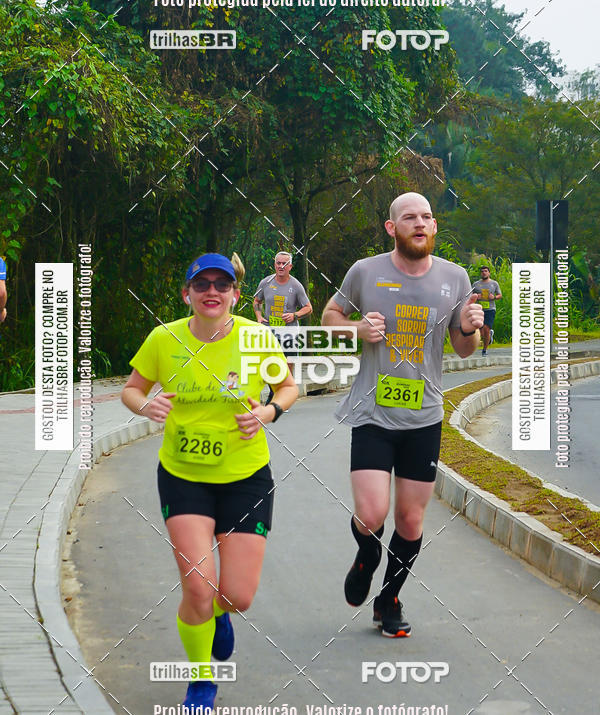 Buy your photos of the eventMeia Maratona de Blumenau on Fotop