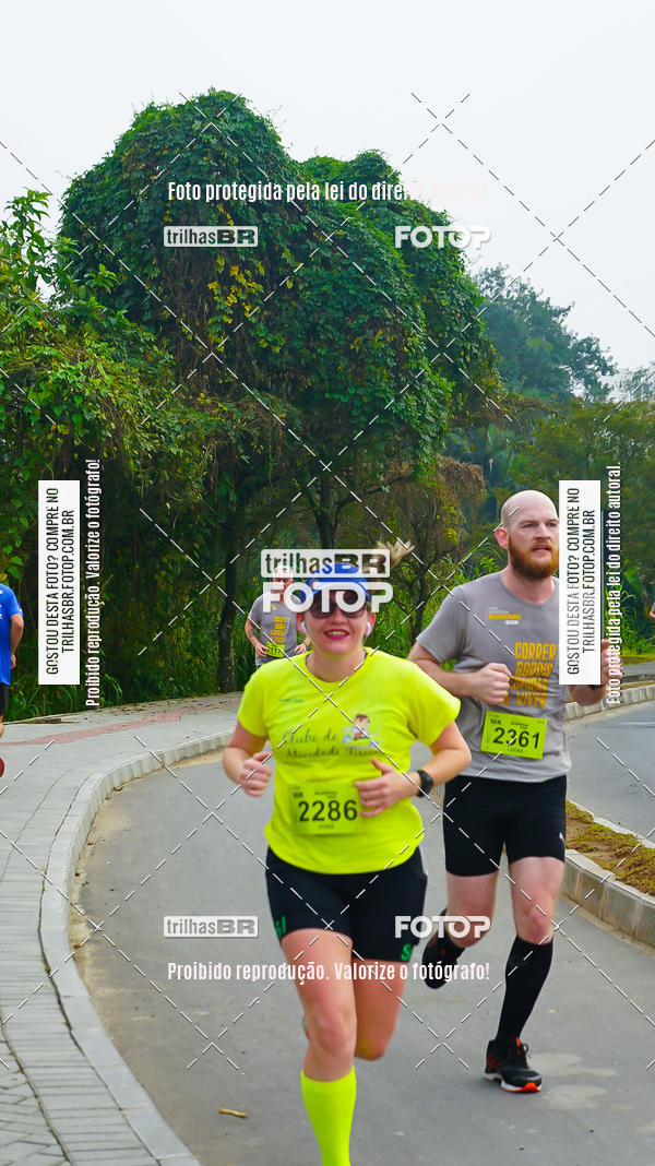 Buy your photos of the eventMeia Maratona de Blumenau on Fotop