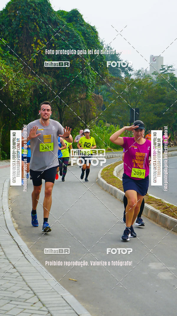 Buy your photos of the eventMeia Maratona de Blumenau on Fotop