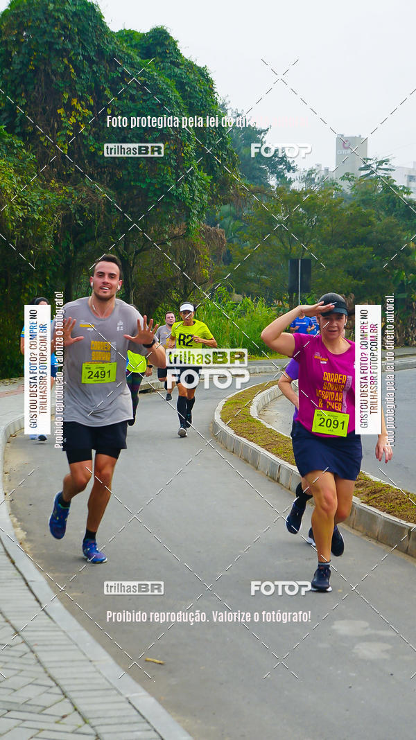 Buy your photos of the eventMeia Maratona de Blumenau on Fotop