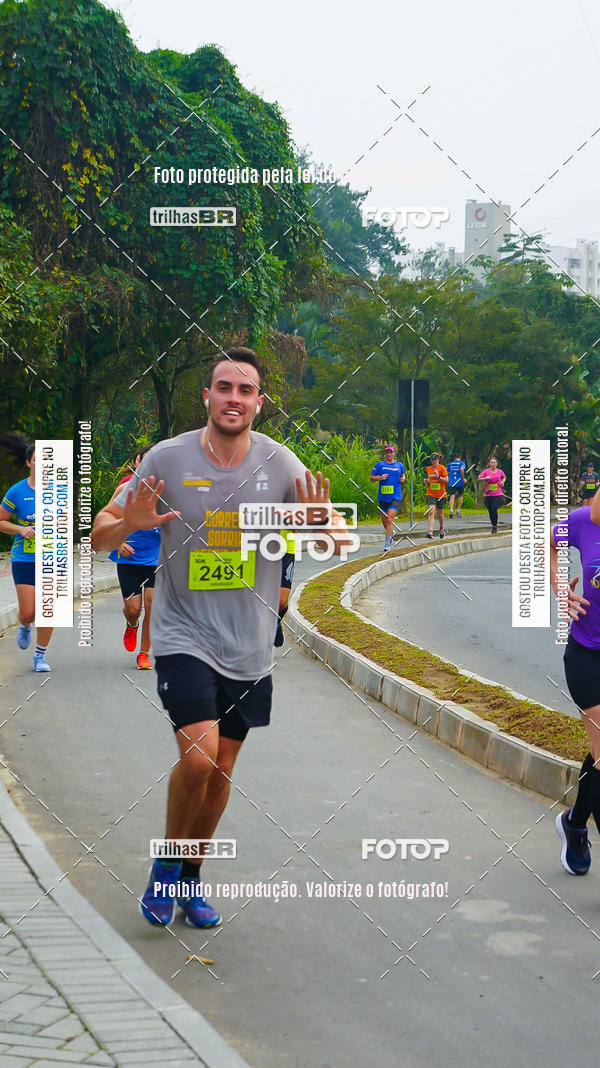 Buy your photos of the eventMeia Maratona de Blumenau on Fotop