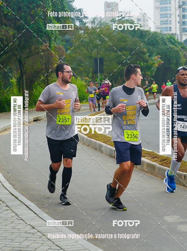 Buy your photos of the eventMeia Maratona de Blumenau on Fotop