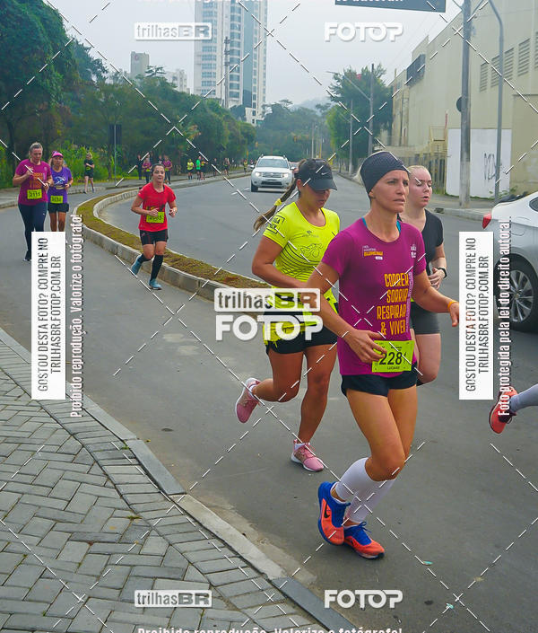 Buy your photos of the eventMeia Maratona de Blumenau on Fotop