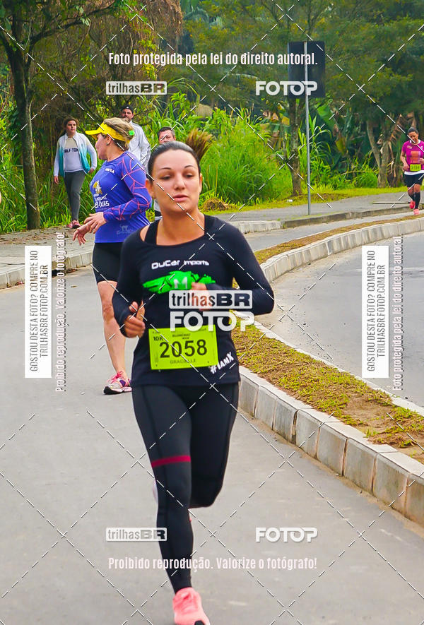 Buy your photos of the eventMeia Maratona de Blumenau on Fotop