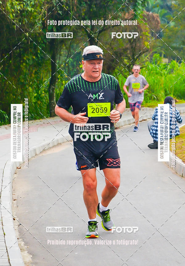 Buy your photos of the eventMeia Maratona de Blumenau on Fotop