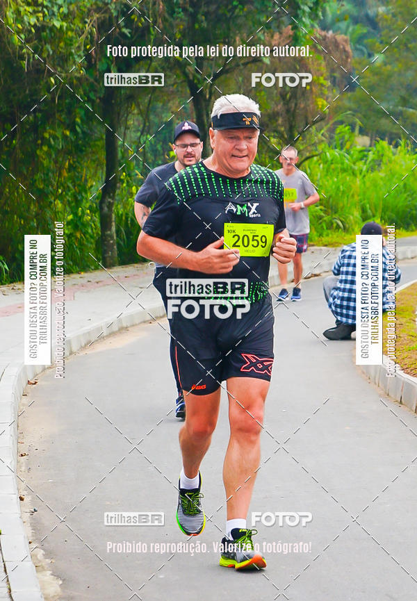 Buy your photos of the eventMeia Maratona de Blumenau on Fotop