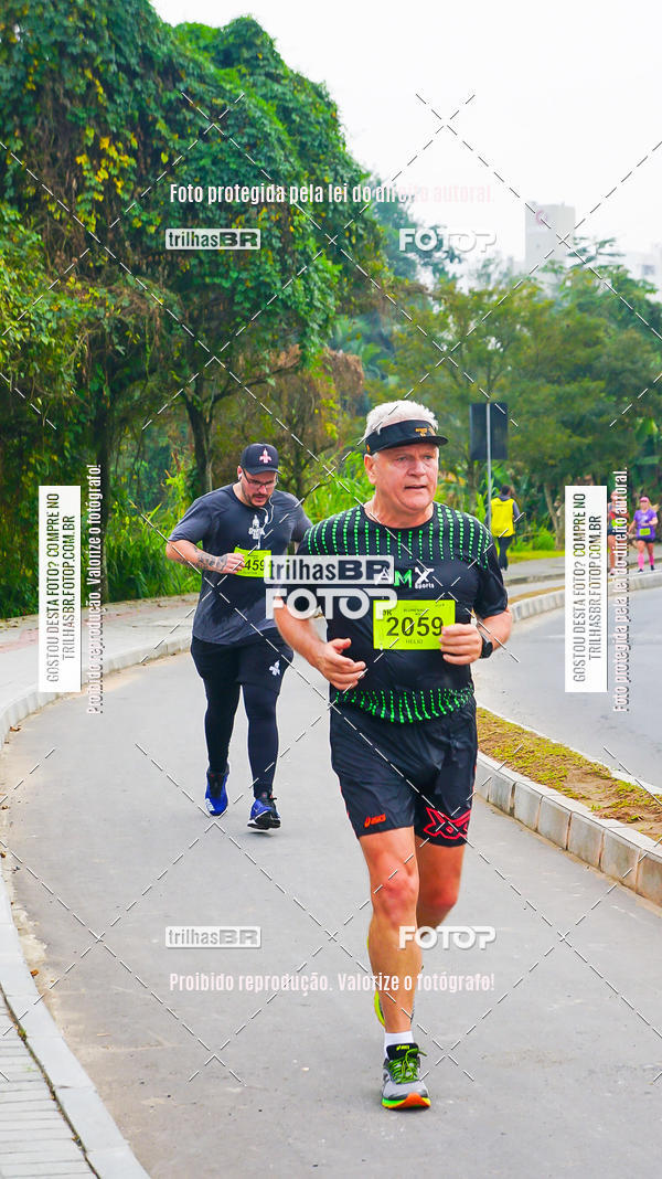 Buy your photos of the eventMeia Maratona de Blumenau on Fotop