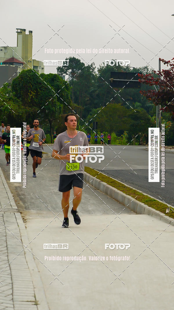 Buy your photos of the eventMeia Maratona de Blumenau on Fotop