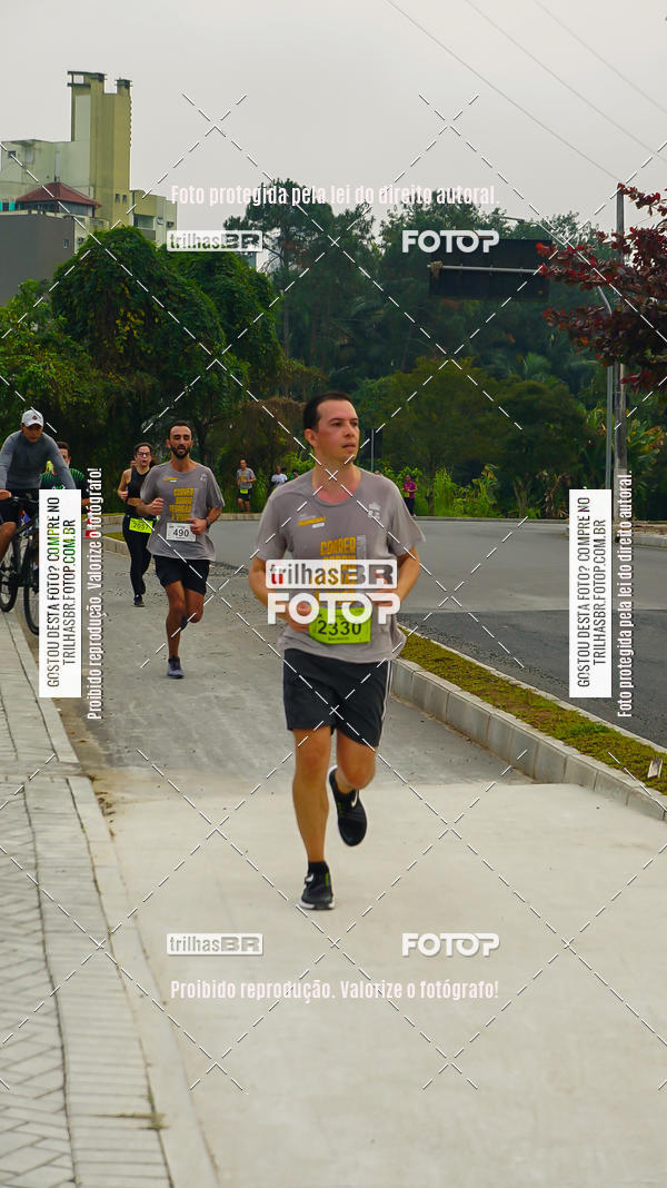Buy your photos of the eventMeia Maratona de Blumenau on Fotop