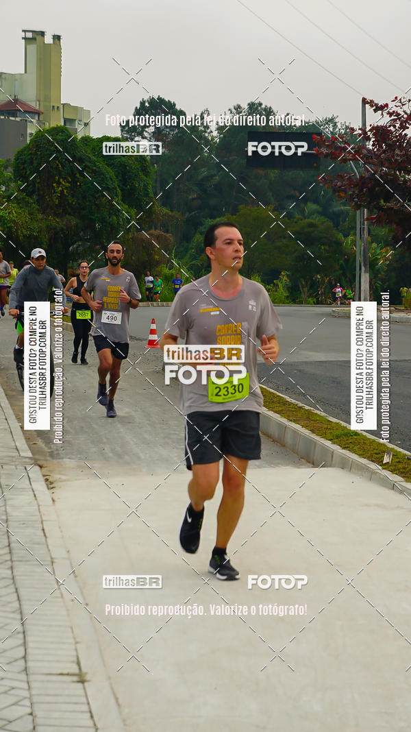 Buy your photos of the eventMeia Maratona de Blumenau on Fotop