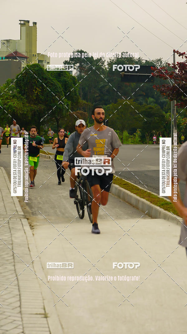 Buy your photos of the eventMeia Maratona de Blumenau on Fotop
