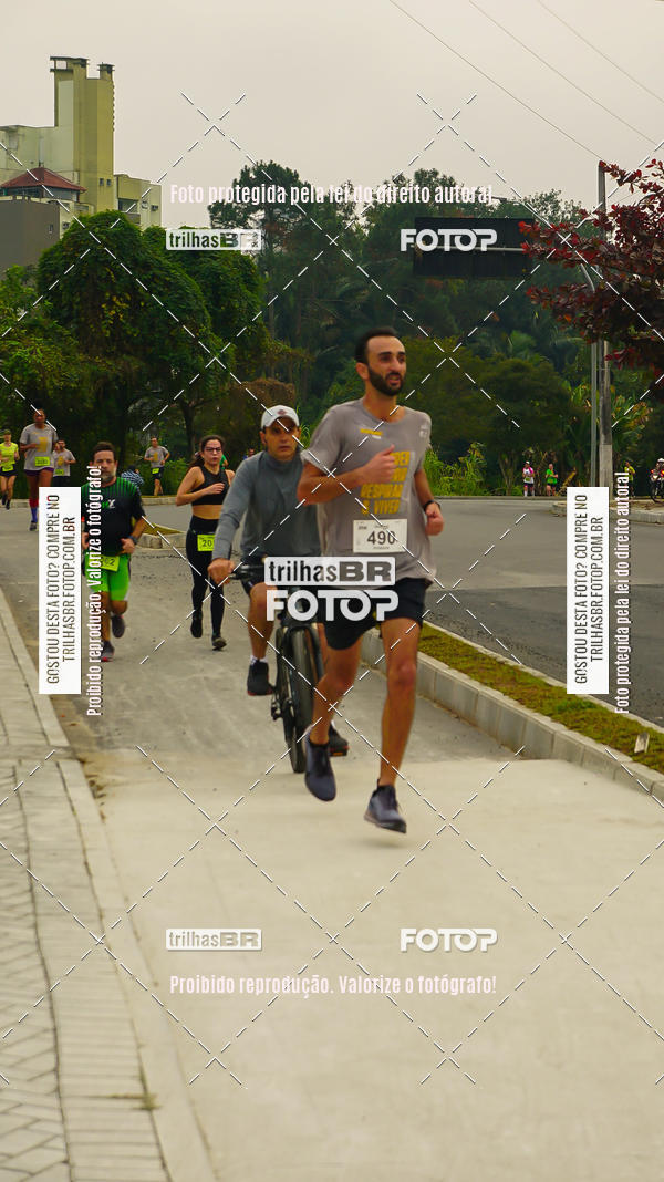 Buy your photos of the eventMeia Maratona de Blumenau on Fotop