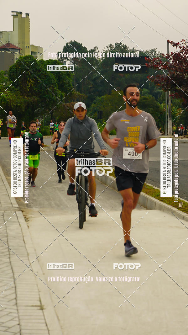 Buy your photos of the eventMeia Maratona de Blumenau on Fotop