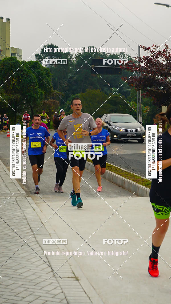 Buy your photos of the eventMeia Maratona de Blumenau on Fotop