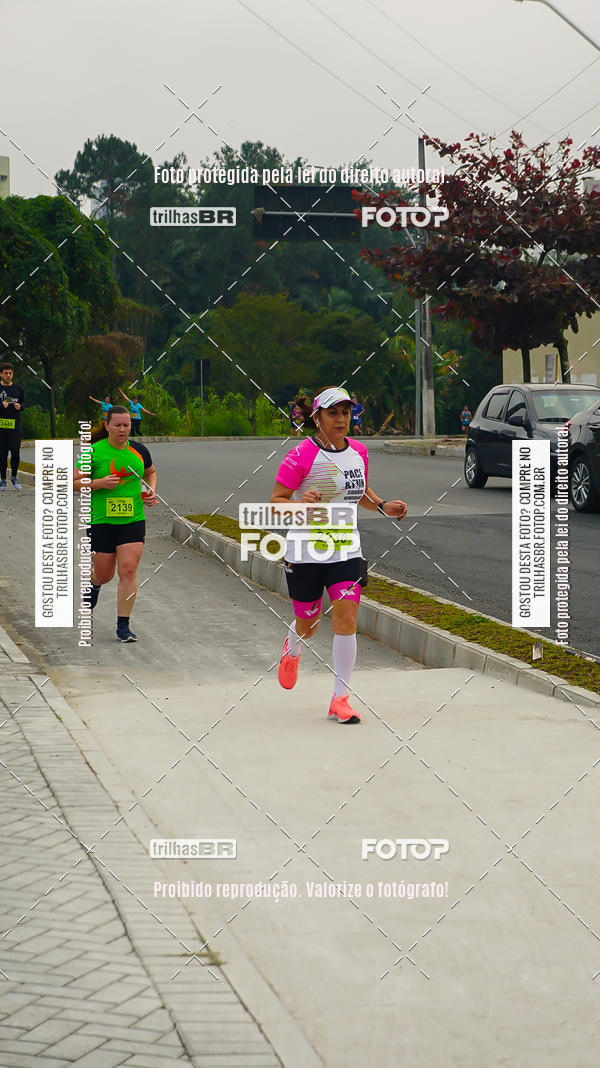 Buy your photos of the eventMeia Maratona de Blumenau on Fotop