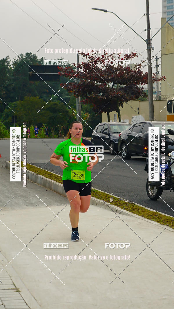 Buy your photos of the eventMeia Maratona de Blumenau on Fotop