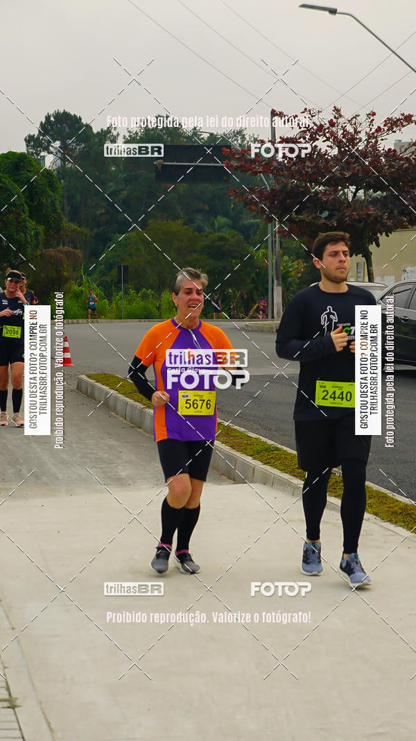 Buy your photos of the eventMeia Maratona de Blumenau on Fotop