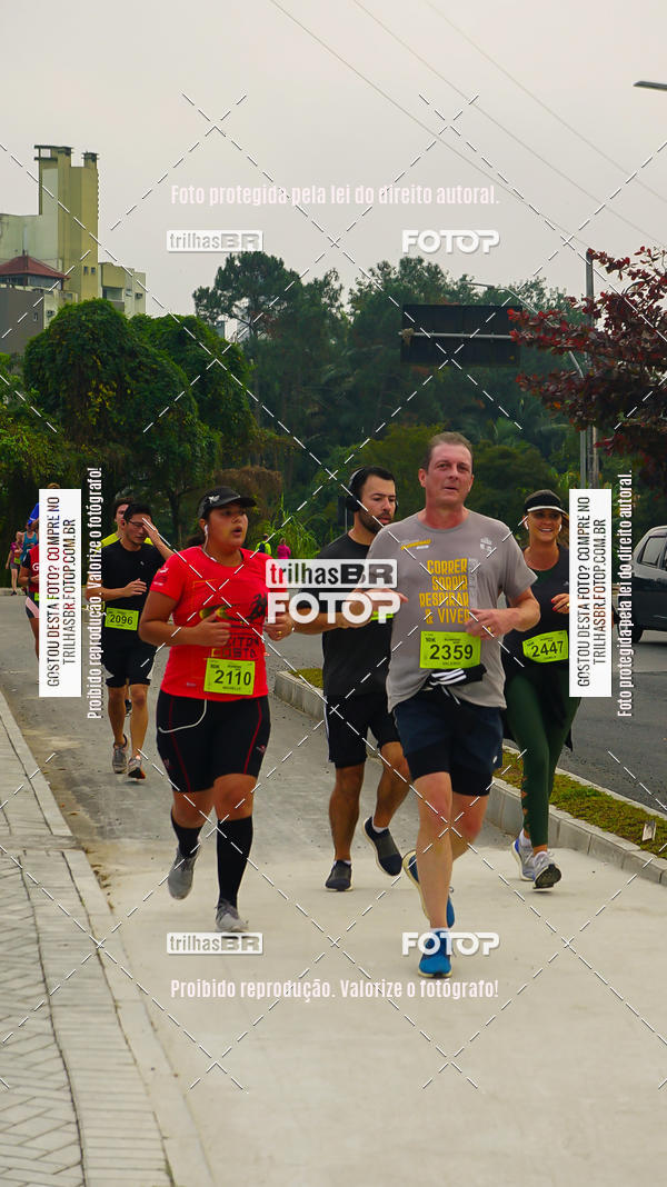Buy your photos of the eventMeia Maratona de Blumenau on Fotop