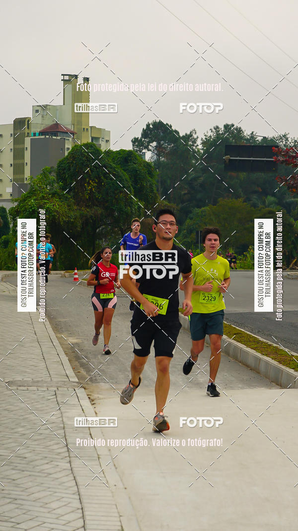 Buy your photos of the eventMeia Maratona de Blumenau on Fotop