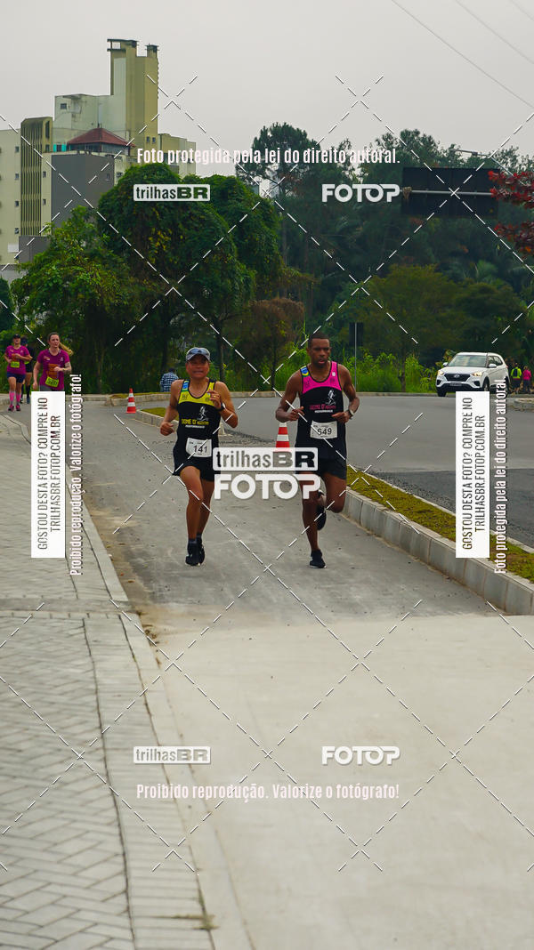 Buy your photos of the eventMeia Maratona de Blumenau on Fotop