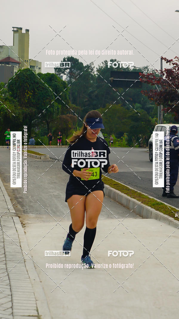 Buy your photos of the eventMeia Maratona de Blumenau on Fotop