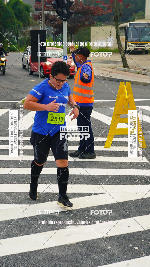Buy your photos of the eventMeia Maratona de Blumenau on Fotop