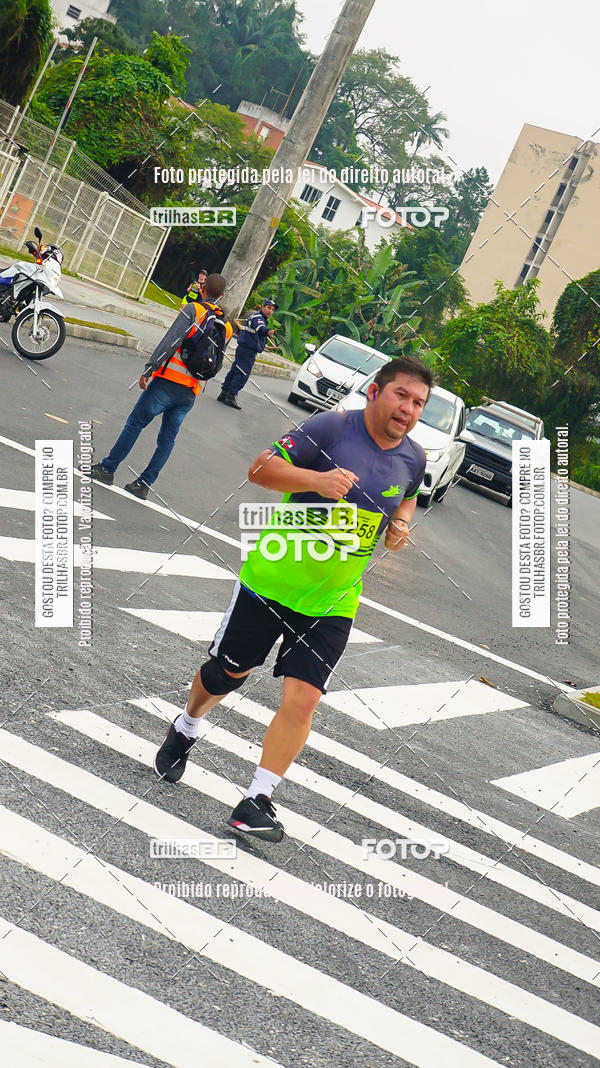 Buy your photos of the eventMeia Maratona de Blumenau on Fotop