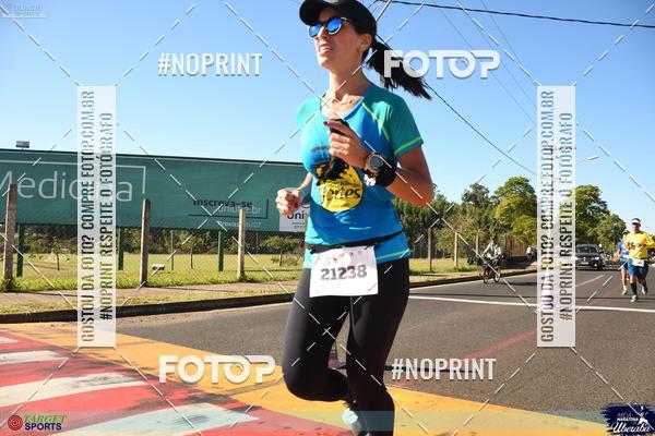 Buy your photos of the eventMEIA MARATONA DE UBERABA on Fotop