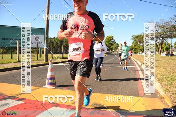 Buy your photos of the eventMEIA MARATONA DE UBERABA on Fotop