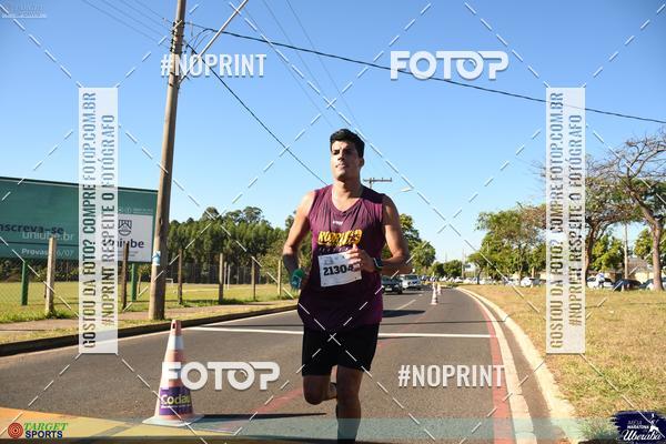 Buy your photos of the eventMEIA MARATONA DE UBERABA on Fotop