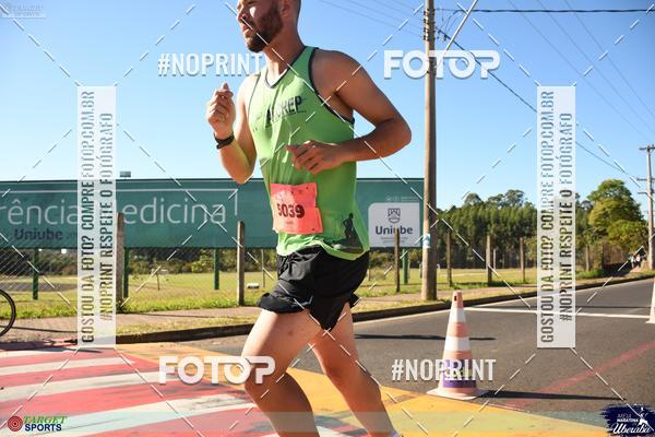 Buy your photos of the eventMEIA MARATONA DE UBERABA on Fotop