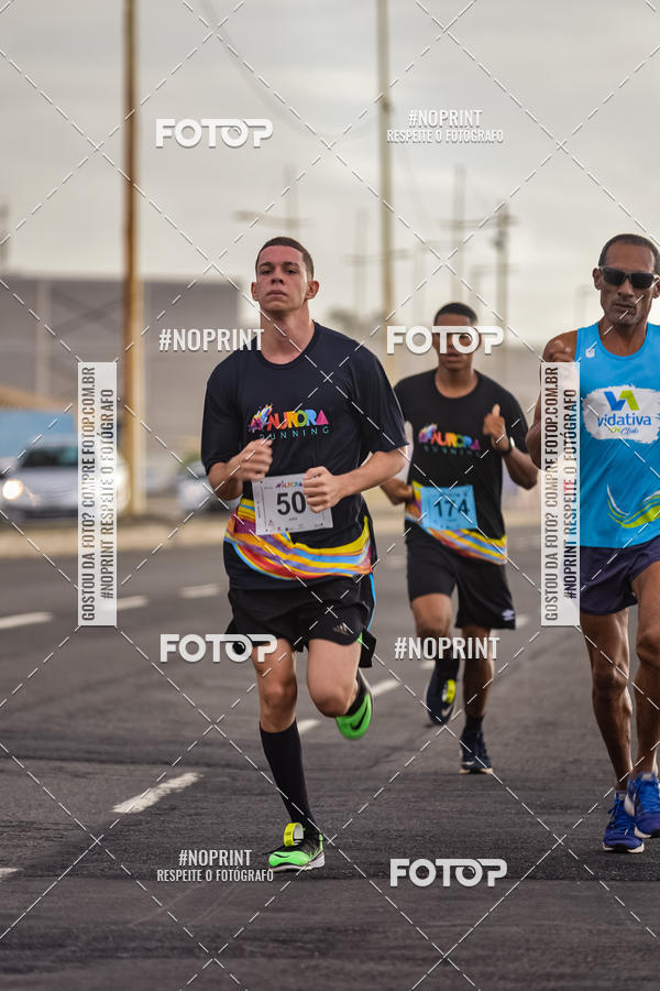 Achetez vos photos de l'vnementAURORA RUNNING sur Fotop